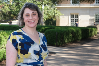Headshot of Staff Merit Award Winner Sara Kennedy outside on a sunny day