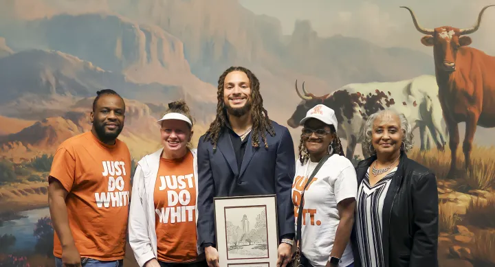 Jordan Whittington, recipient of 2023-24 Mike Wacker Award, and family